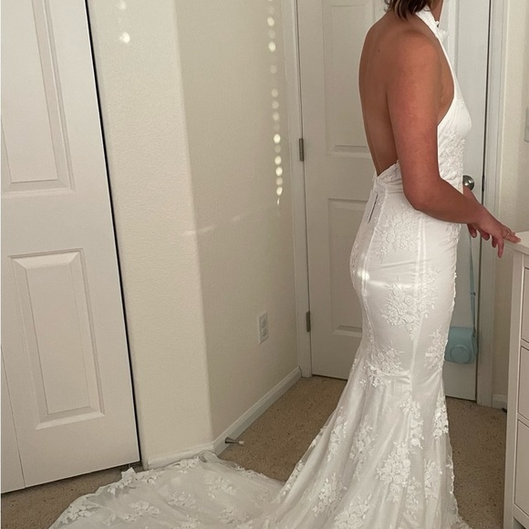 Dreamy Glamour White Embroidered Halter
Mermaid Maxi Dress - Picture 8 of 11